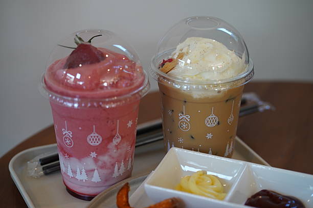 Delightful Festive Beverages in Decorative Cups with Cozy Dessert Accompaniments on a Wooden Table