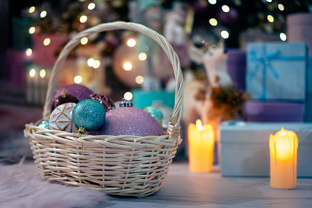 istock Christmas and new year background. Bright candles and crhristmas tree decorations 2249108785