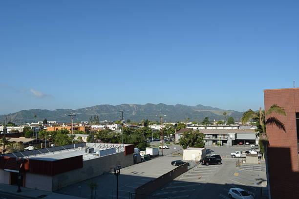 istock Skyline View Featuring Distant Mountains and Urban Landscape at Mid-Morning in a Peaceful Neighborhood 2249111236