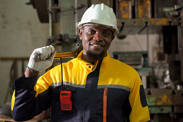 istock African American engineer smiling confidently in industrial factory. 2249117380