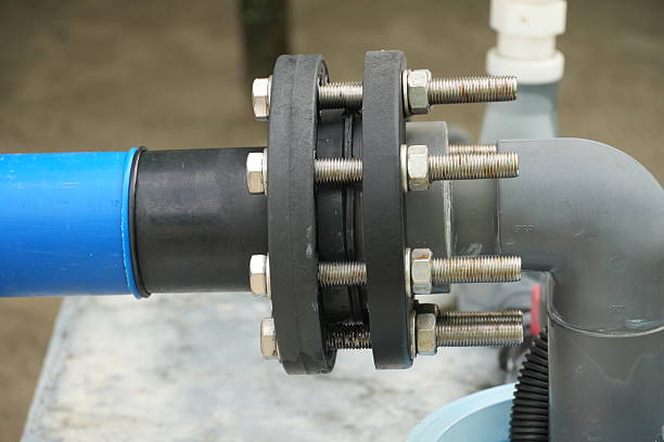 istock Durable plumbing connection with sturdy bolts and flanges for industrial water systems and fluid management 2249117885