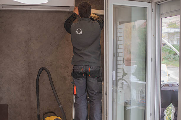 istock A craftsman is installing an air conditioner 2249124241