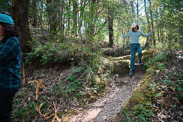 istock Girl Stepping Down a Forest Path While Hiking in Uttarakhand, India 2249127958