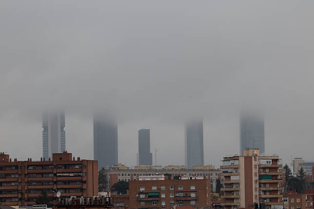 Madrid skyscraper area called Cuatro Torres at sunrise in Madrid, Spain