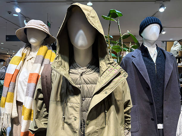 Women's clothing displayed in the boutique window, retail and consumerism concept