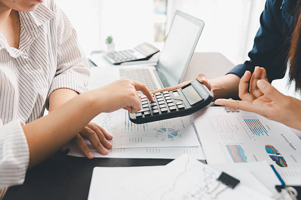 istock Business meeting, data analytics or women with graph presentation in office. Chart, analysis accounting team brainstorming economy, inflation or solution. business project finance investment concept. 2249130521