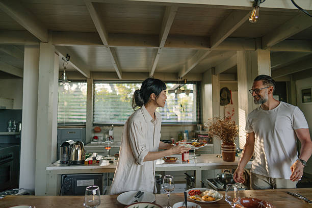 istock Multiracial couple hosting a dinner party 2249131062