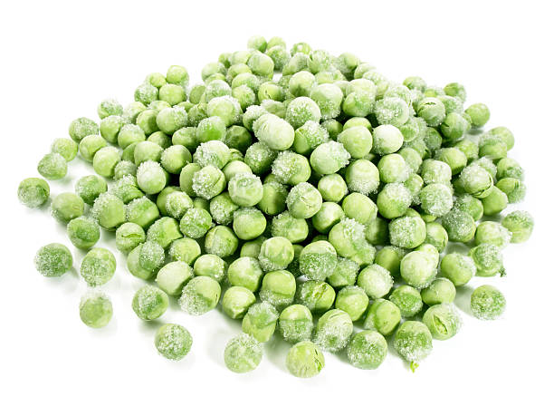 istock Vegetables - Frozen Peas on white Background 2249131775