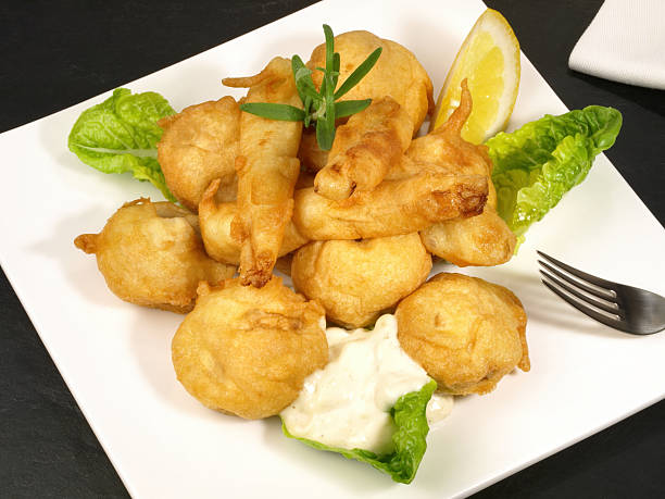 istock Vegetables - Fried Champignon and Vegetables with Garlic Sauce on a Plate 2249131808