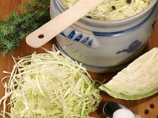 istock Vegetables - Making Fresh Sauerkraut on wooden Background 2249132126