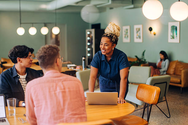 istock Group conversation with diverse professionals in a casual office setting 2249134226