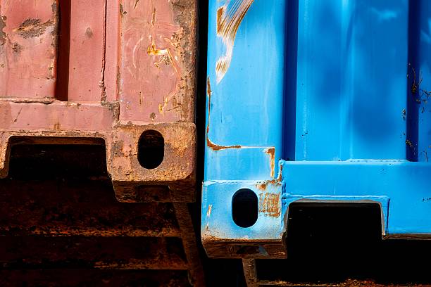 closeup of a retail display of a pile of heavily rusted and weathered metal containers, for sale at a junkyard, Long Island, NY