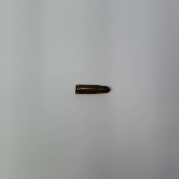 Rustic black bullet displayed on a clean white background, suitable for military themes, weapon concepts, tactical visuals, and ammunition displays.