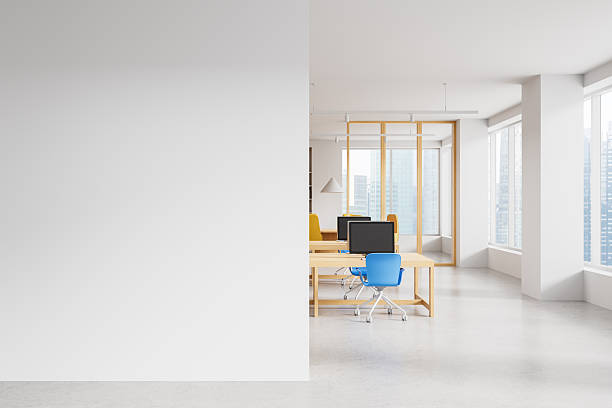 istock Modern office interior with blank white wall partition and city view windows for poster mockup or copyspace template background concept. 3D Rendering 2249145518