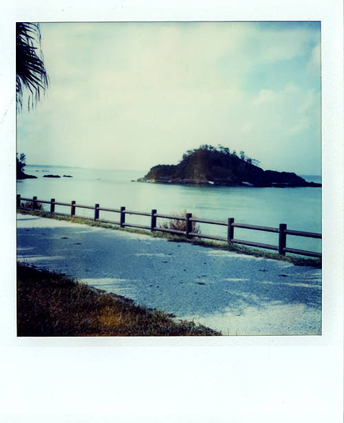 istock Paved walking paths in Okinawa Polaroid photo instant camera 2249145956