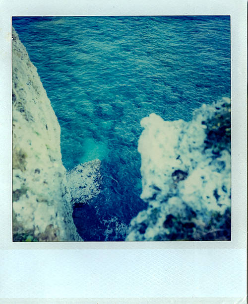 istock Okinawa's coral sand beach Polaroid photo instant camera 2249145957