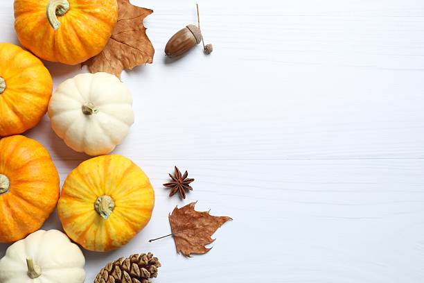 istock Beautiful autumn composition with pumpkins on a white background, top view 2249147767