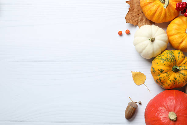 istock Beautiful autumn composition with pumpkins on a white background, top view 2249147798