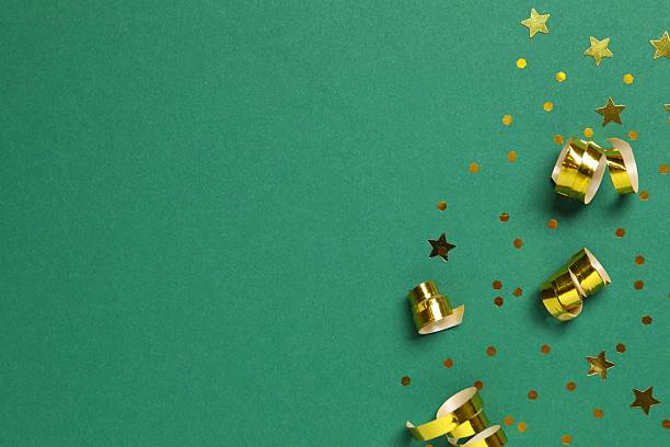 istock Golden confetti on color background, top view 2249149174