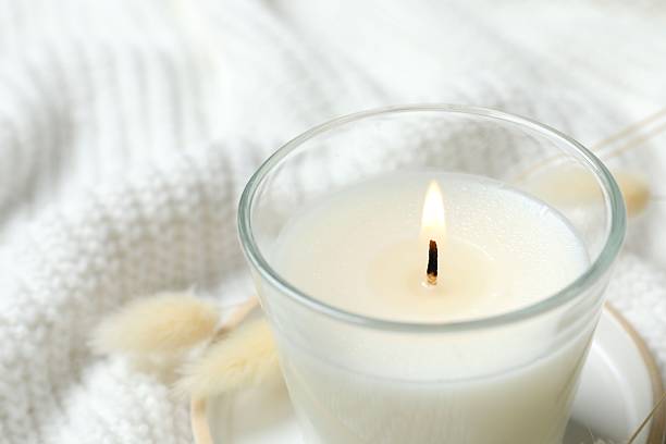 istock Close-up of aromamic candle burning on the table 2249149486