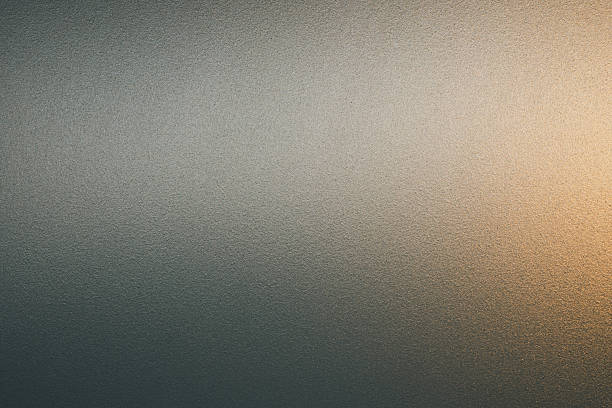 istock Abstract frosted glass texture with soft gradient natural lighting from gray to warm amber. Minimal background for design, sleek, calm aesthetic, architectural element, luxury surface and wallpapers. 2249151928