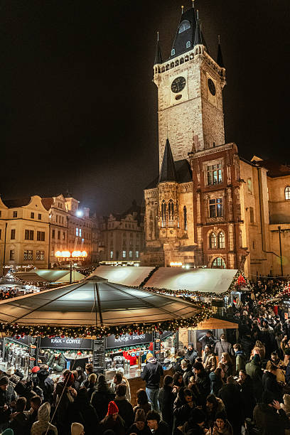 istock Night market under historic clock tower 2249153384