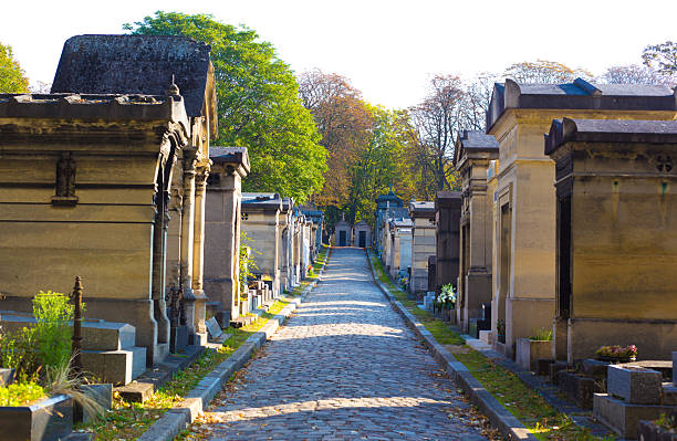 Paris, France: Cobbled lane in Pere Lachaise Cemetery, 11th arrondissement