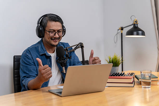 istock Young Man Recording a Podcast in a Studio for His Online Career 2249159258
