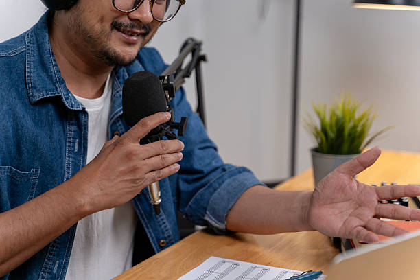 istock Young Man Recording a Podcast in a Studio for His Online Career 2249159261