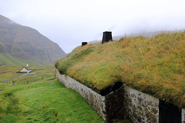 Streymoy, Faroe Islands, Denmark - August 26 2025: the Saksun Heritage Farm with grass roofs