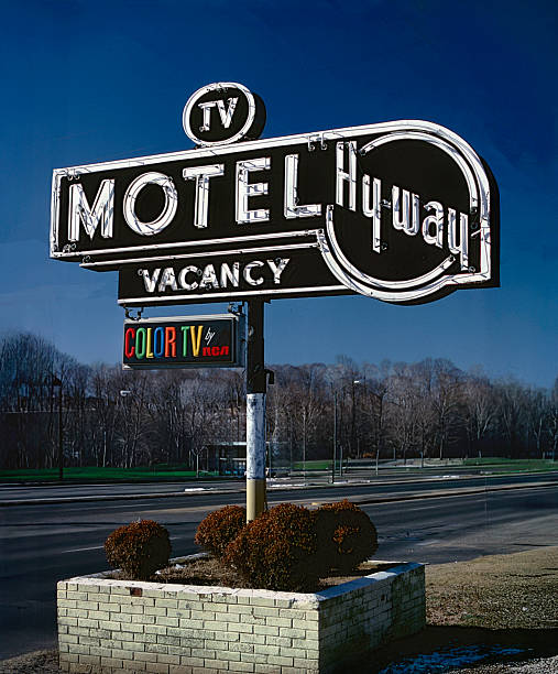 Fairfax, VA, USA - August 10, 2005 - close up of the  classic Americana mid-20th century style roadside marketing sign for the Motel Hyway, which has subsequently been closed and the sign demolished
