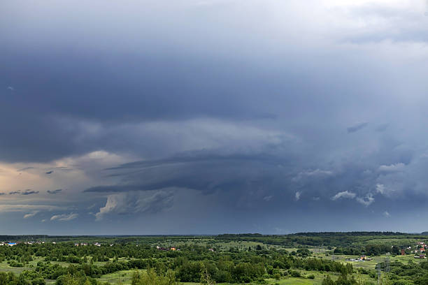 istock Dark dramatic sky with thunderclouds in the countryside.  natural background with clouds 2249166851