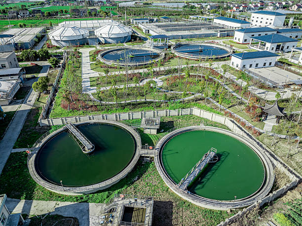 istock Wastewater treatment plant with circular settling tanks. 2249168628