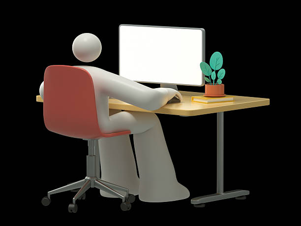 istock A man sits at a desk facing away from the viewer 2249171998