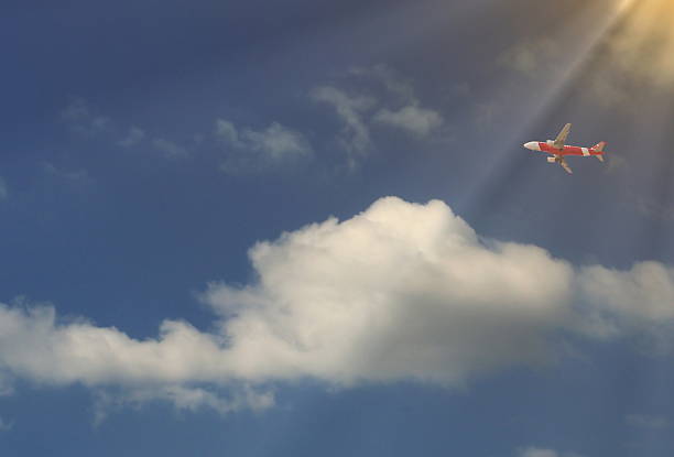 Image of an airplane flying in the sky.
