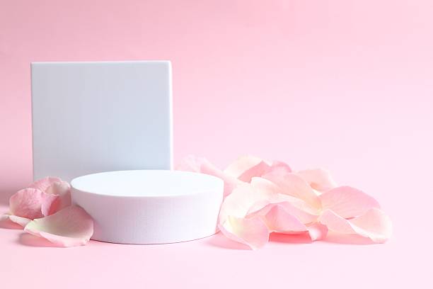 istock Pink rose petals with podium 2249175411
