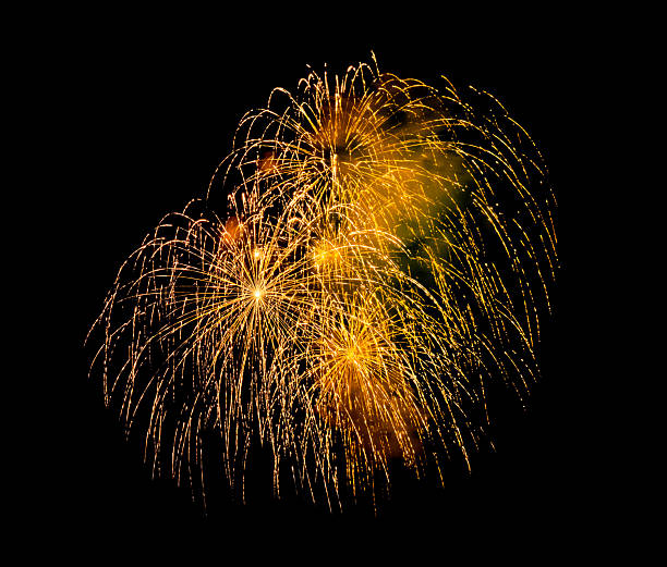 Festive golden fireworks display isolated on black background for celebration and anniversary