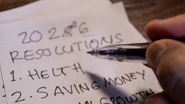 istock A pen points toward the newly written 2026 under a crossed-out 2025, emphasizing reflection, transition, and preparation for refreshed goals in the new year. 2249181694