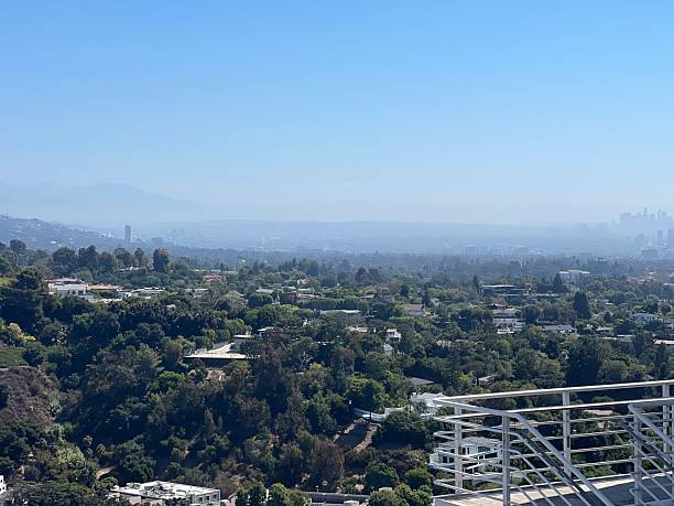 istock Vast Urban Landscape Viewed From a Scenic Overlook on a Bright Clear Day 2249184525