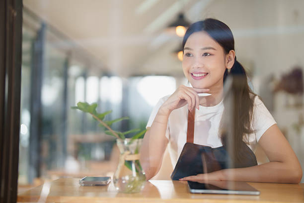 istock Smiling woman small business owner planning future 2249188194