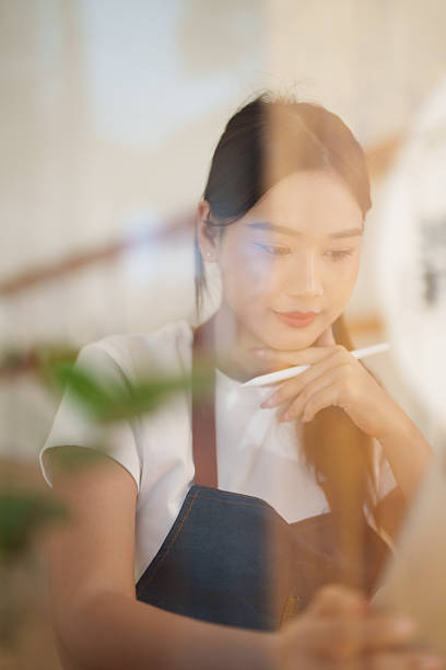 istock Female entrepreneur thinking about her small business ideas 2249188226