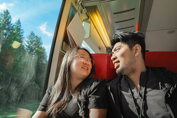 istock Passengers Relaxing Inside Train Cabin. Stock Photo 2249194555