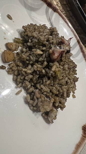 istock Black rice with sheafood on a plate 2249195699