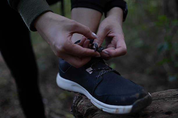 istock A person is tying their shoe laces 2249196457