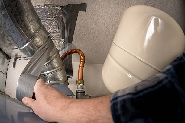 istock Work is being done on duck work hot water heater 2249196756
