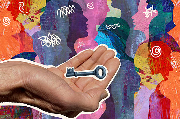 Hand holding/ offering a  key with a background of crowd of people
