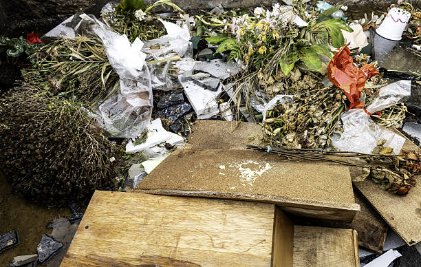istock Dried and dead flowers with a coffin 2249207993