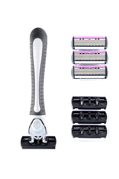 istock shaving razor and a stack of blades nearby 2249211733