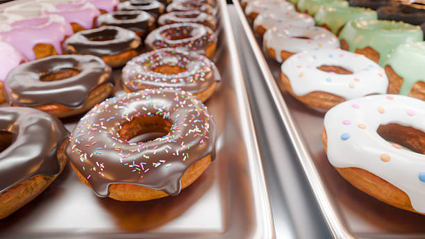 istock Colorful donuts lined up on a tray 2249214648