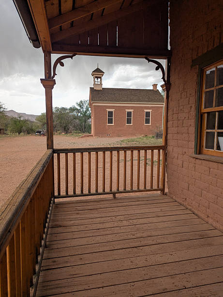 Grafton Ghost Town in Rockville Utah showing the Church and Community Center from the porch of a historic old house.